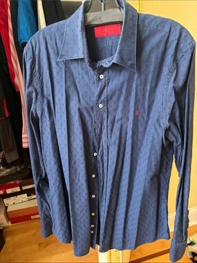 CAROLINA HERRERA 
SIZE 16.5 
DARK BLUE 100% COTTON 
RED CH LOGO UPPER LEFT